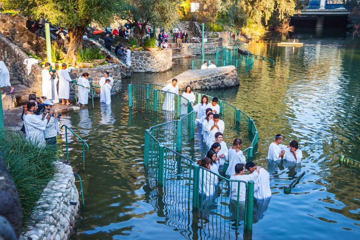 Christian pilgrims baptized in the Jordan River